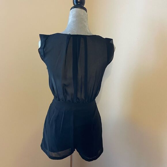 Black romper with mesh back - Picture 1 of 3